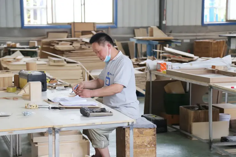 Hand Assembly Workstation at Caoxian Xin Xiaomu factory